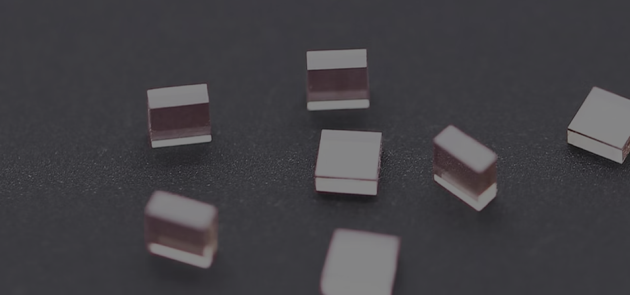 Pink blocks of diamond on a gray background