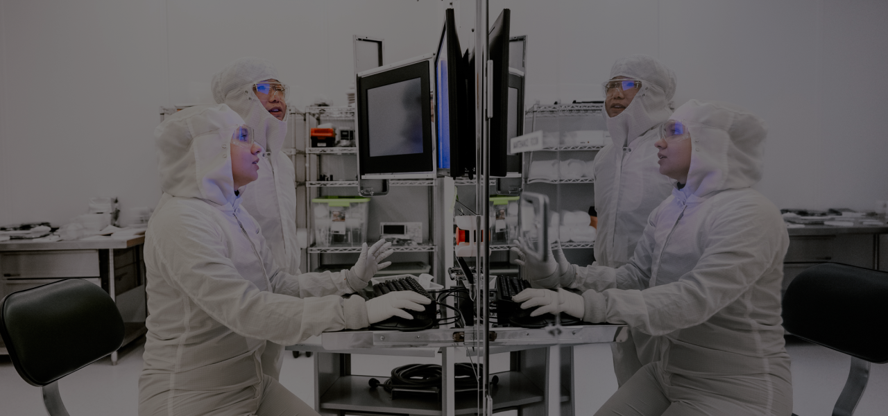 darkened image of scientists in Argonne lab