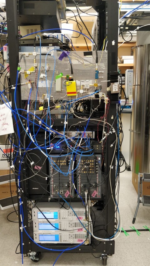Most of the current control and readout systems for superconducting quantum computers use off-the-shelf commercial equipment in which researchers must string together a dozen or more expensive components resulting bulky and expensive control systems. Photo: The University of Chicago