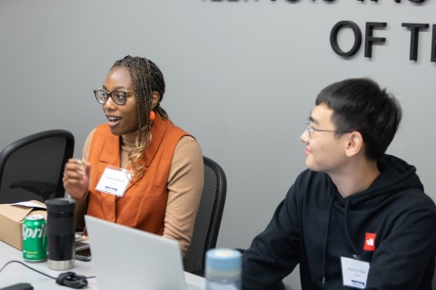 Angela Abongwa and Jingchun Shao in a breakout session at the Big Q Hackathon. 