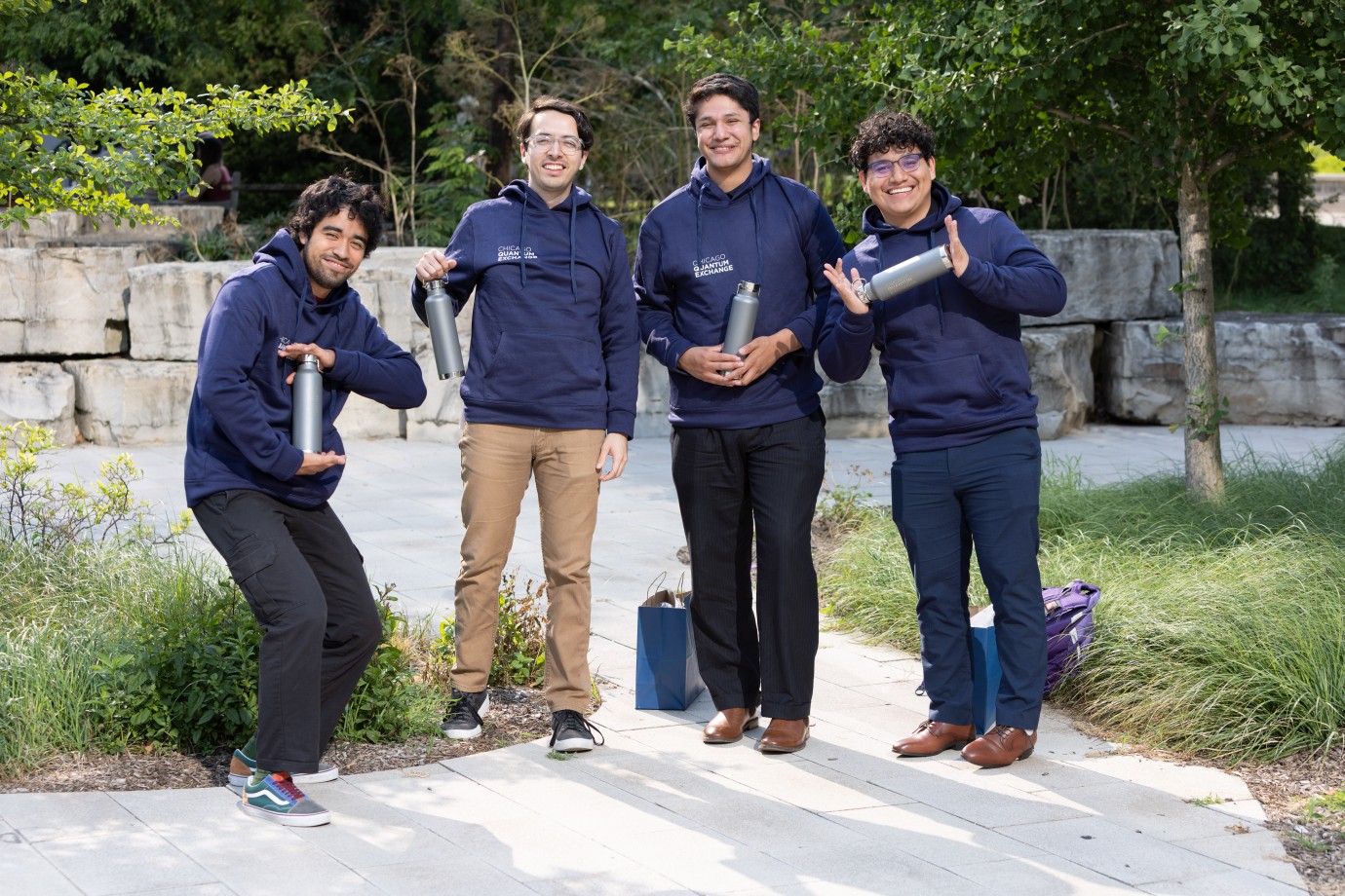 Manny Hernandez, Olisser Gomez, Jonathan Andrade Plascencia, and Selvin Tobar pose in their new CQE swag at the 2023 OQI Research Symposium.