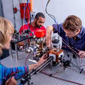 QuEra scientists work on the company’s neutral-atom quantum computer, Aquila. 