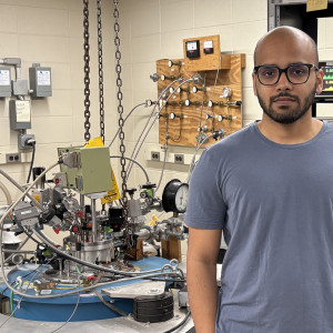 Adithya Suresh in front of the experimental station