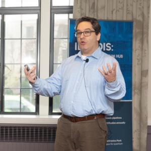 Photo of Nikos Hardavellas speaking in a classroom setting.