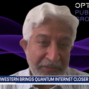 Close-up of a man with gray hair and a beard in a striped shirt, against a black background with purple waves. Text below reads, “NORTHWESTERN BRINGS QUANTUM INTERNET CLOSER.”