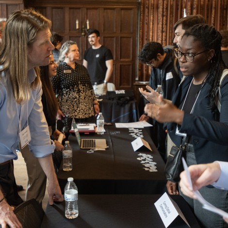 A job candidate talks to Corning at the Quantum Recruiting Forum